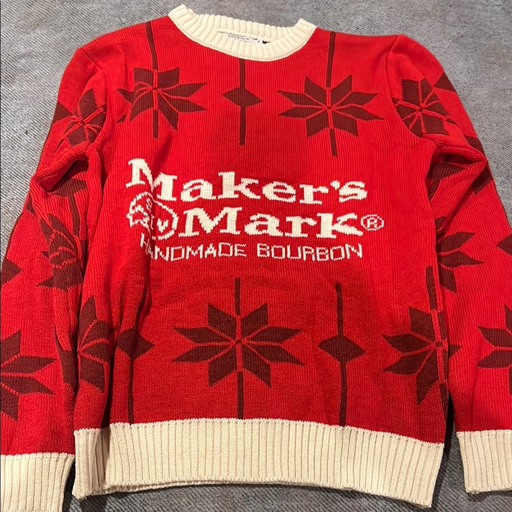 Bright Red Crewneck Sweater with Snowflake Design and White Text